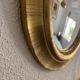 Vintage 1970s sun mirror witch's eye wood and gold - 42 cm