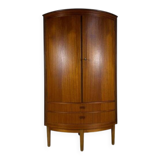 Mid-century modern corner furniture in teak with doors.