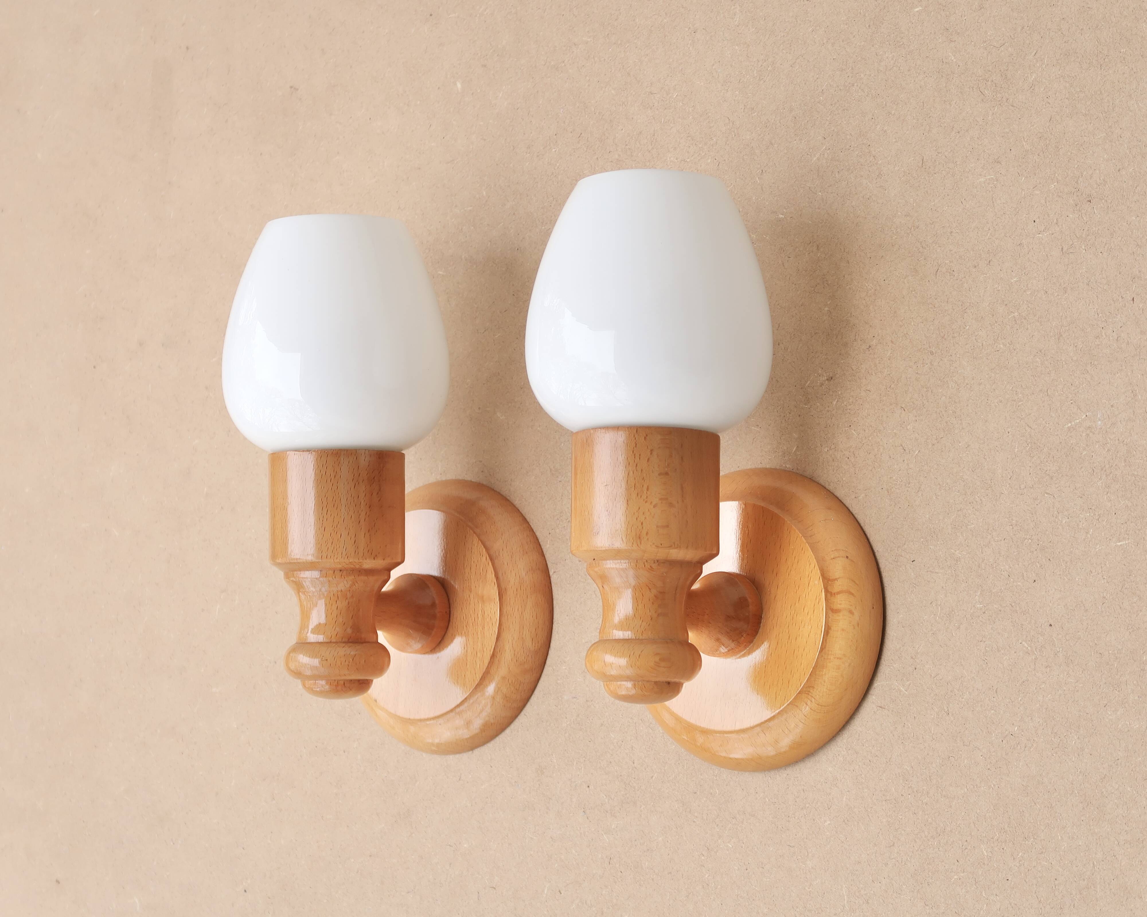Pair of pine wood and white glass wall lights, 1970s
