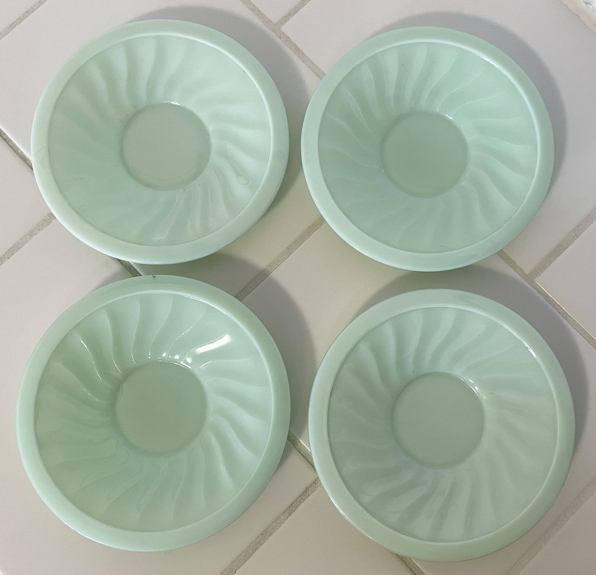 Set of 4 mint green opaline saucers with a swirl pattern, made in France.