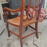 Mulched armchair of golden rye in solid walnut period Restoration around 1820
