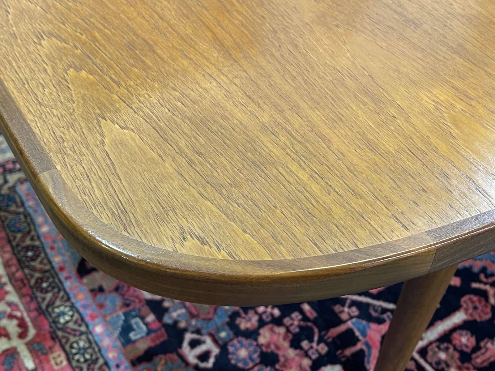 G-Plan teak table from the 1970s with butterfly extension.