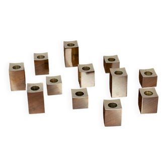 Group of cubic solid brass candlesticks by Gusum Metallslöjden, Sweden