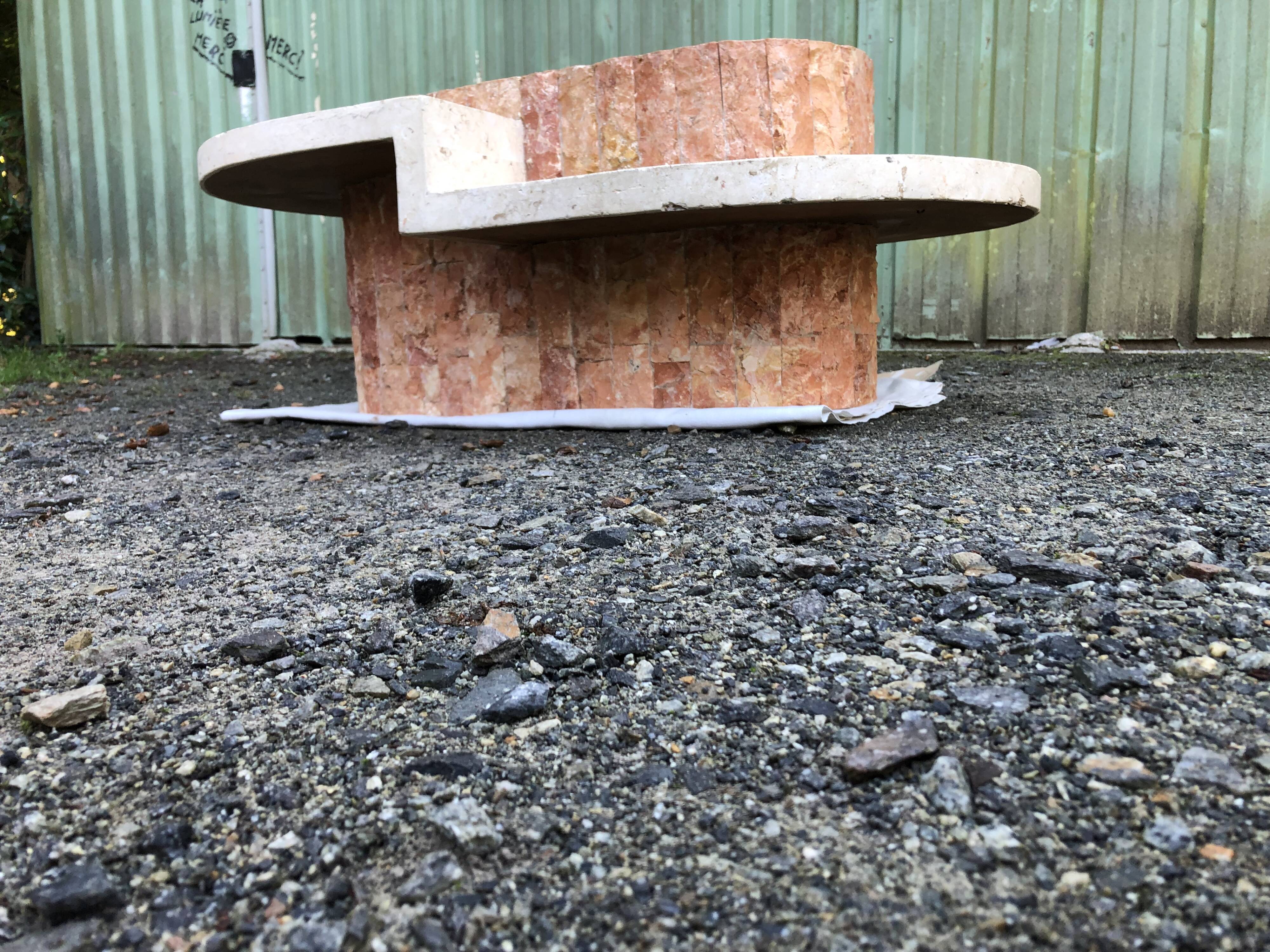 Vintage asymmetrical design coffee table in Mactan travertine stones by Magnussen ponte.