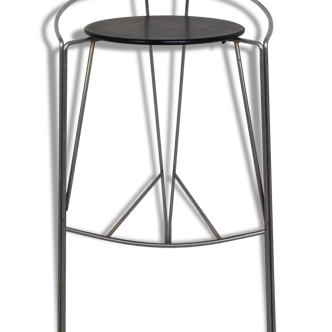 A silver Moon bar stool design of Pascal Mourgue