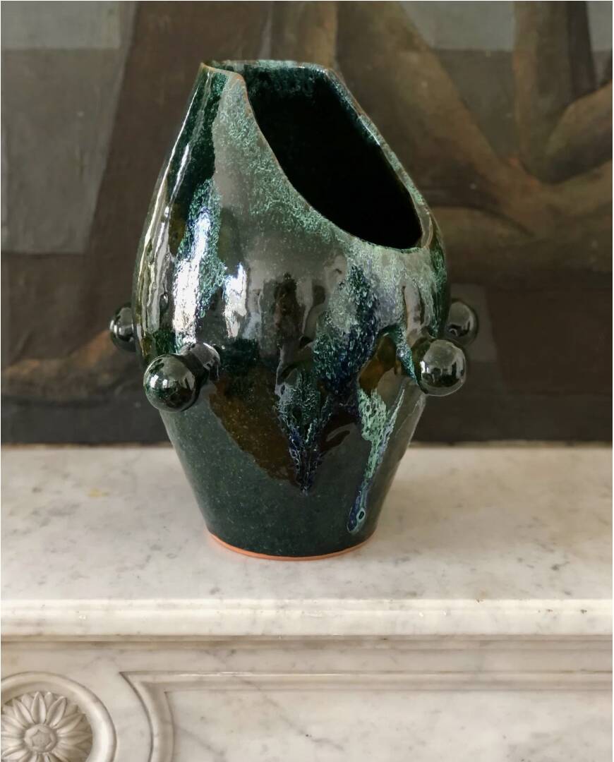 Glazed green and blue ceramic vase.