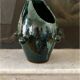 Glazed green and blue ceramic vase.