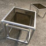 Set of coffee tables, pedestal tables and nesting tables in smoked glass and metal