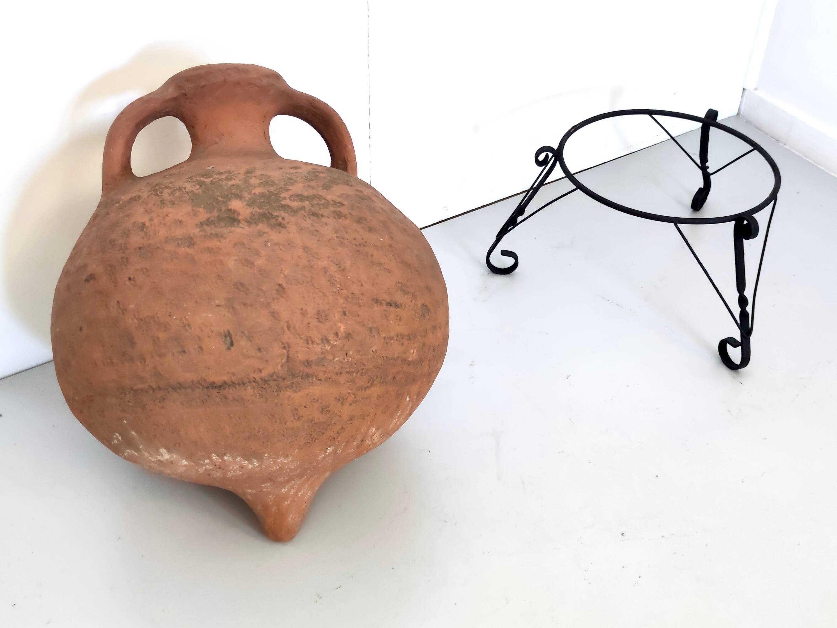 Hand-Modeled Earthenware Jar with a Black Varnished Iron Stand, Italy