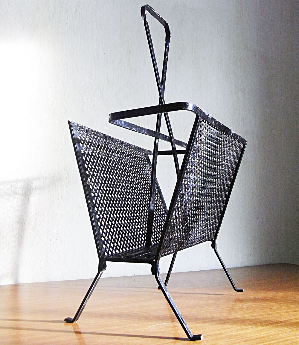 Black magazine door Mathieu Mategot in perforated metal 50s