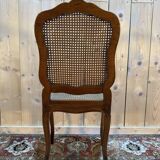 Set of 10 Louis XV style chairs in walnut and cane.