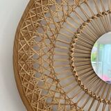 Decorative mirror woven in sun cane