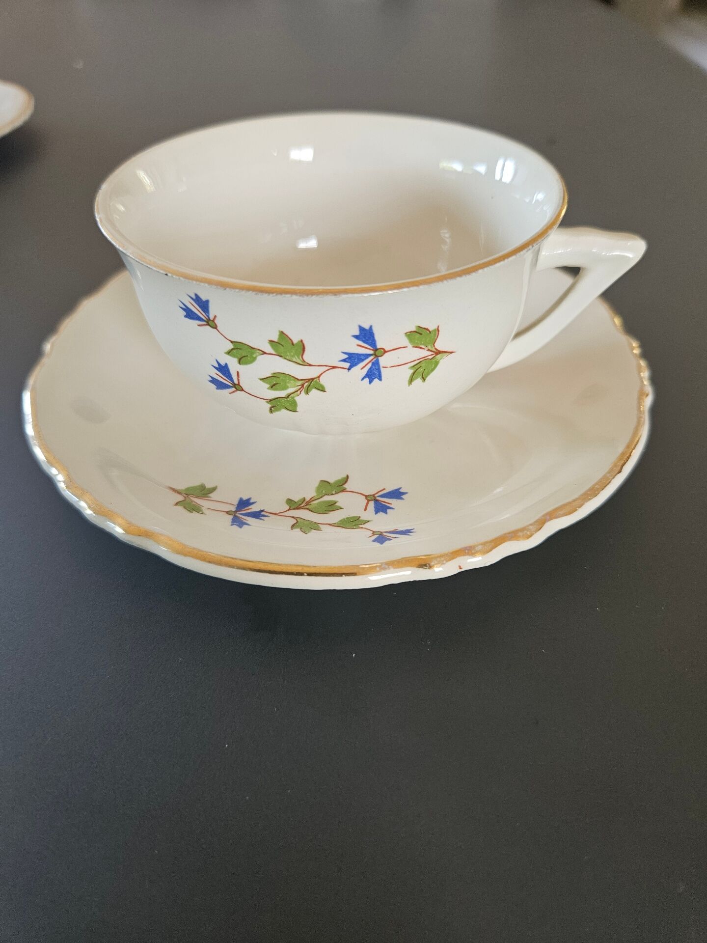 charming set of 4 cups and their 4 matching saucers in earthenware