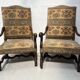 Paire de fauteuils de style Louis XIII a haut dossiers plats XX siècle