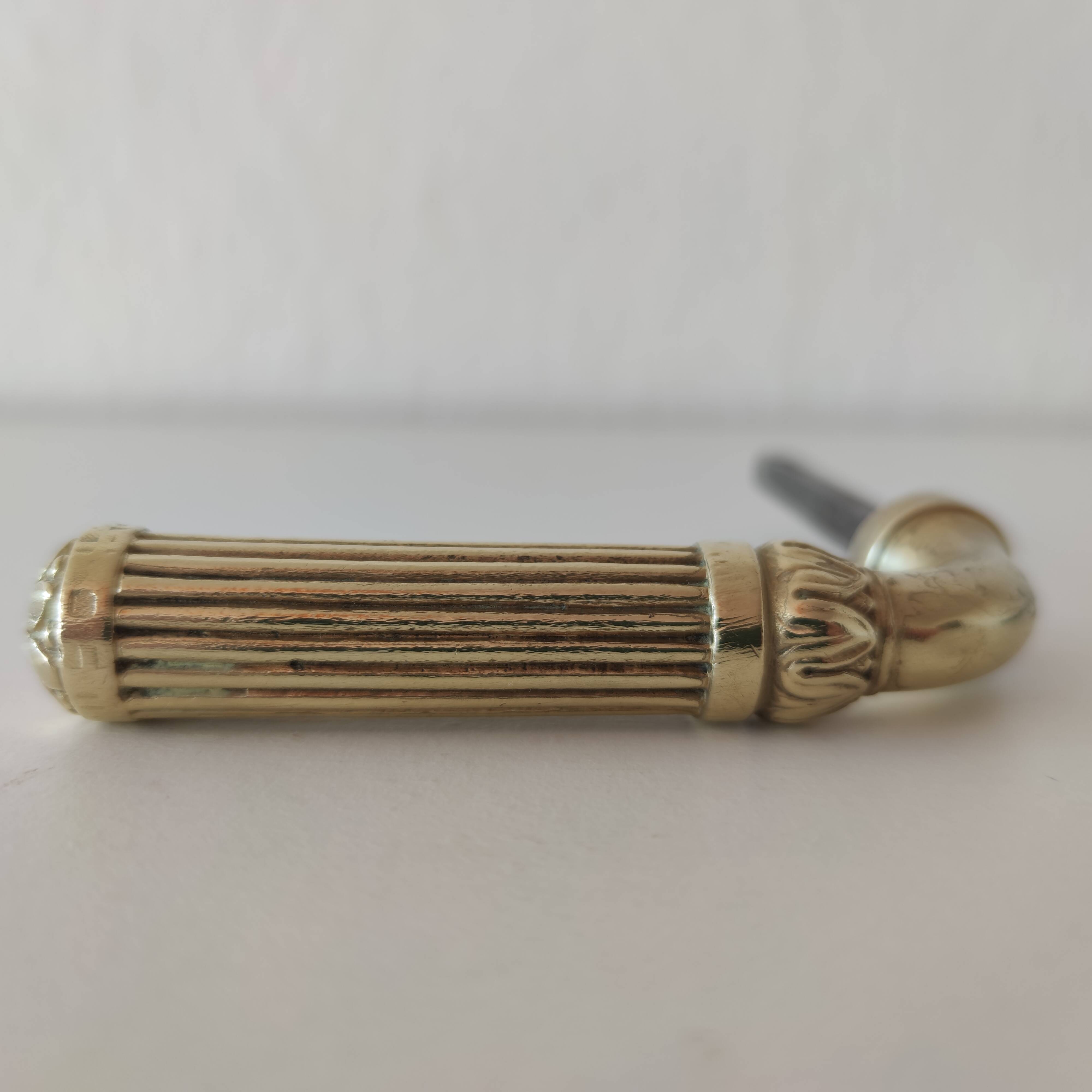 An old Louis XVI crutch door handle