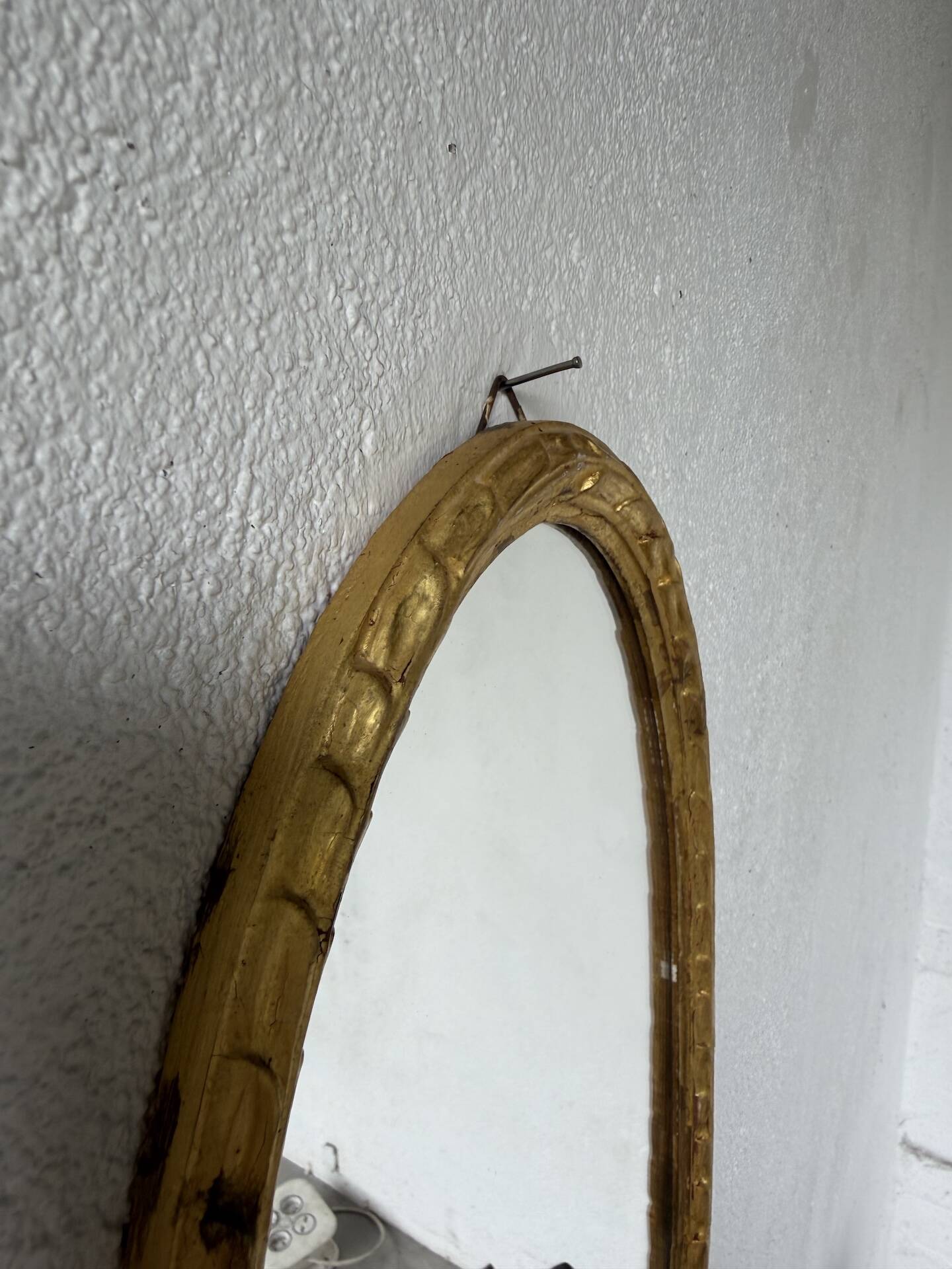 Pair of oval mirrors 1900 gilded stucco