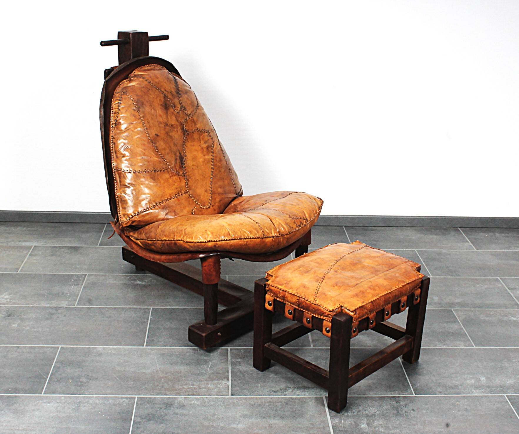 Brutalist oak lounge chair and ottoman, 1970s, set of 2