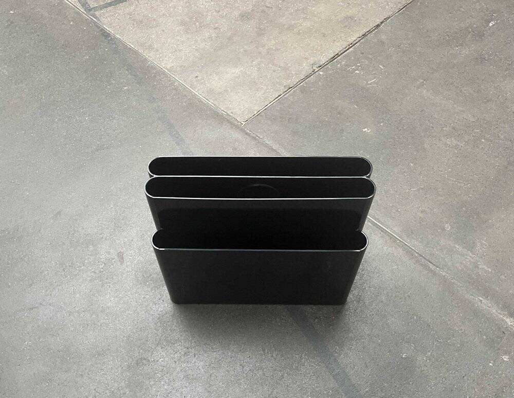 Magazine rack model 4676 from the mid-century space age by Giotto Stoppino for Kartell, 1970s.