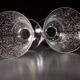 Two Baccarat glasses model "Michelangelo" in engraved crystal.