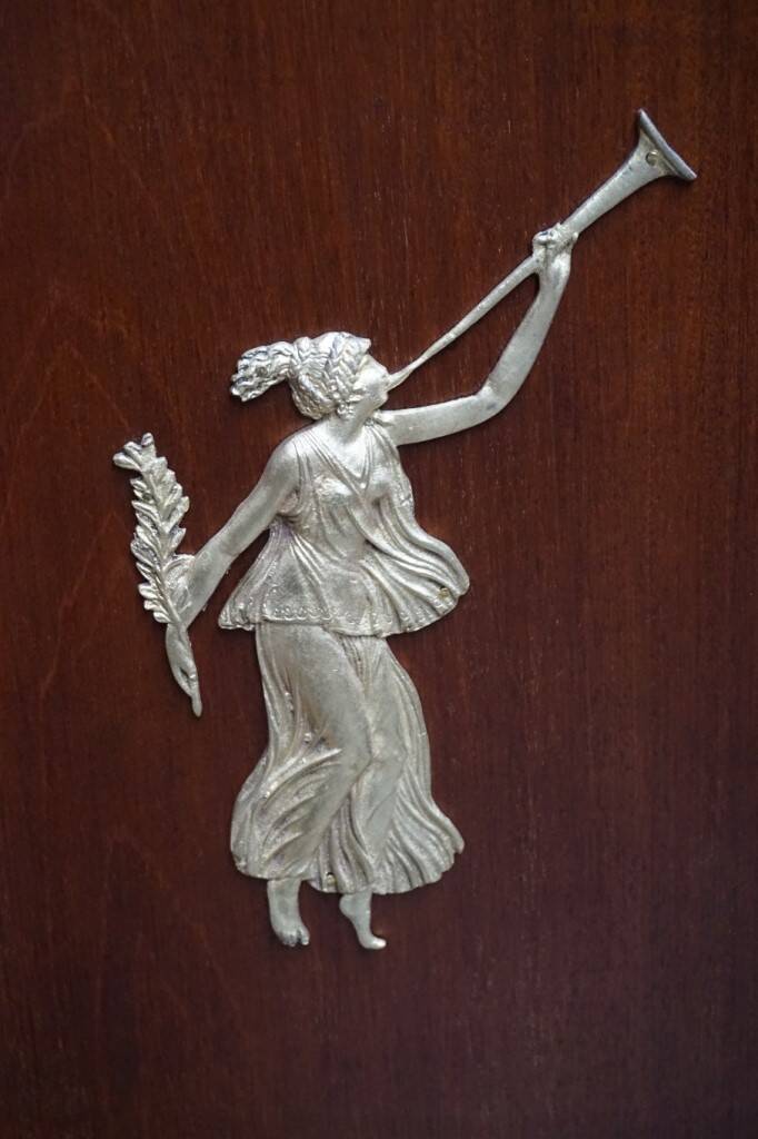 Empire style mahogany display bookcase with gilt bronze decoration and three doors.