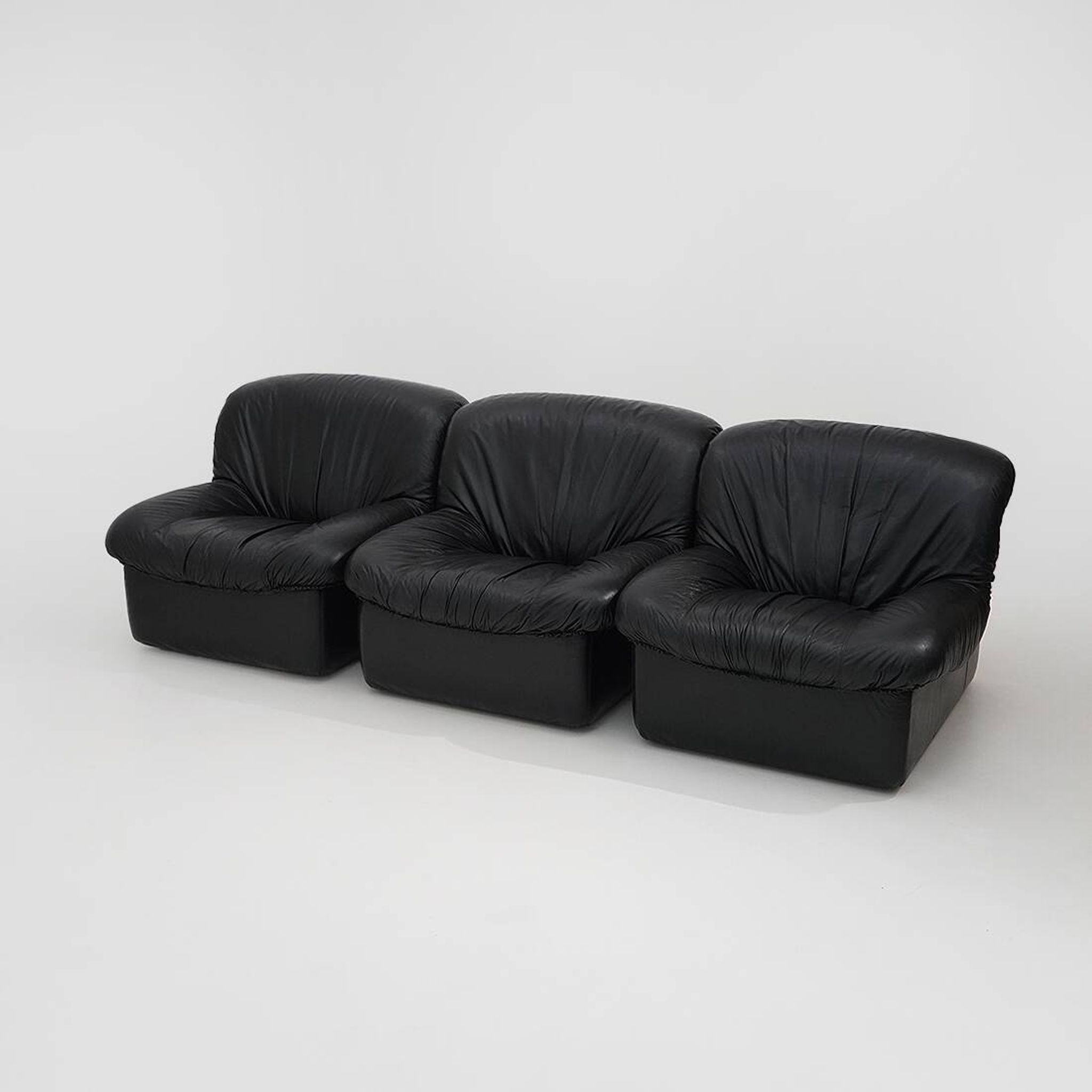 Modular black leather armchairs, 1970s