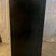 Asian-inspired black lacquered wooden wardrobe