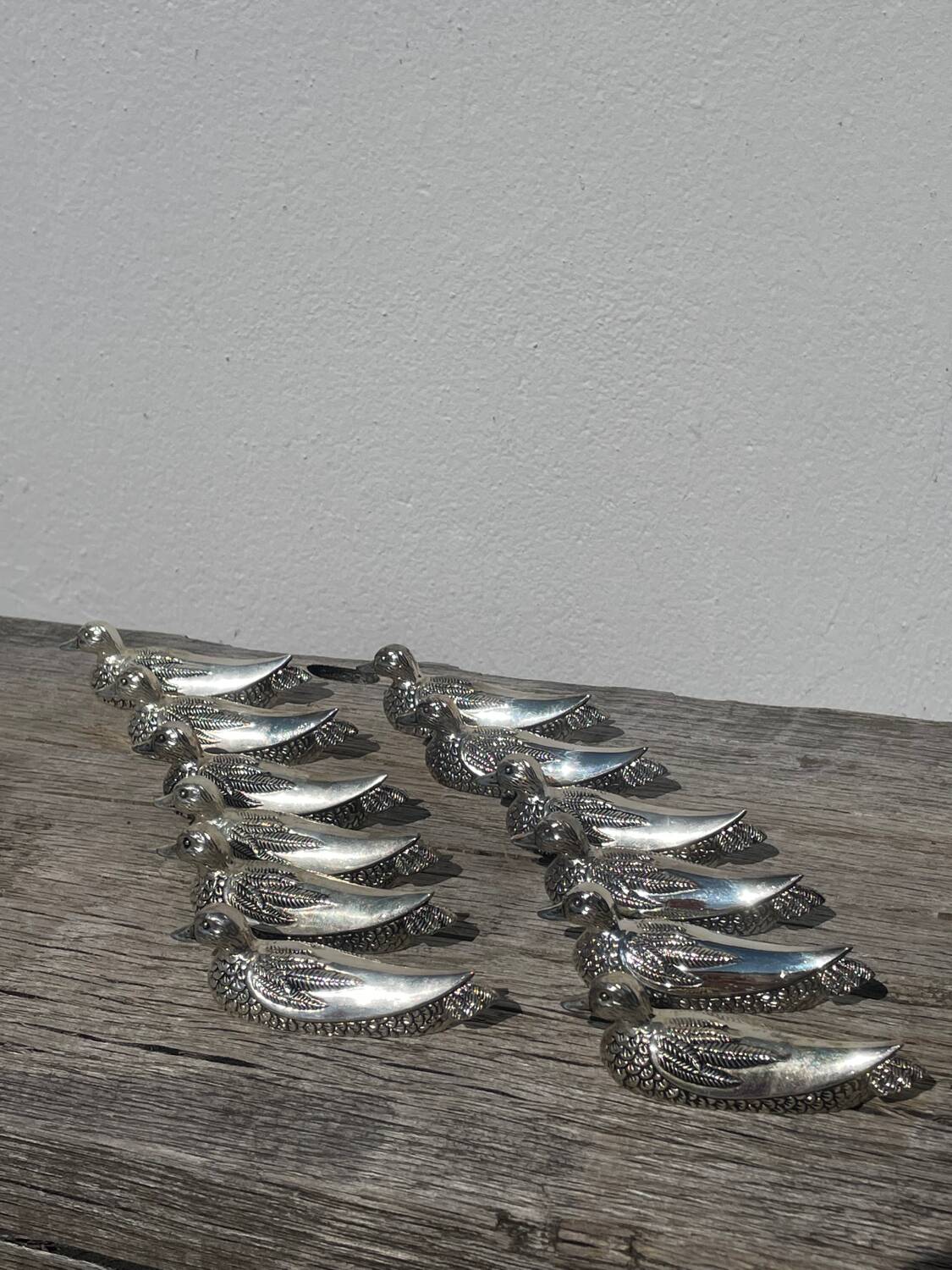 12 silver metal duck knife rests