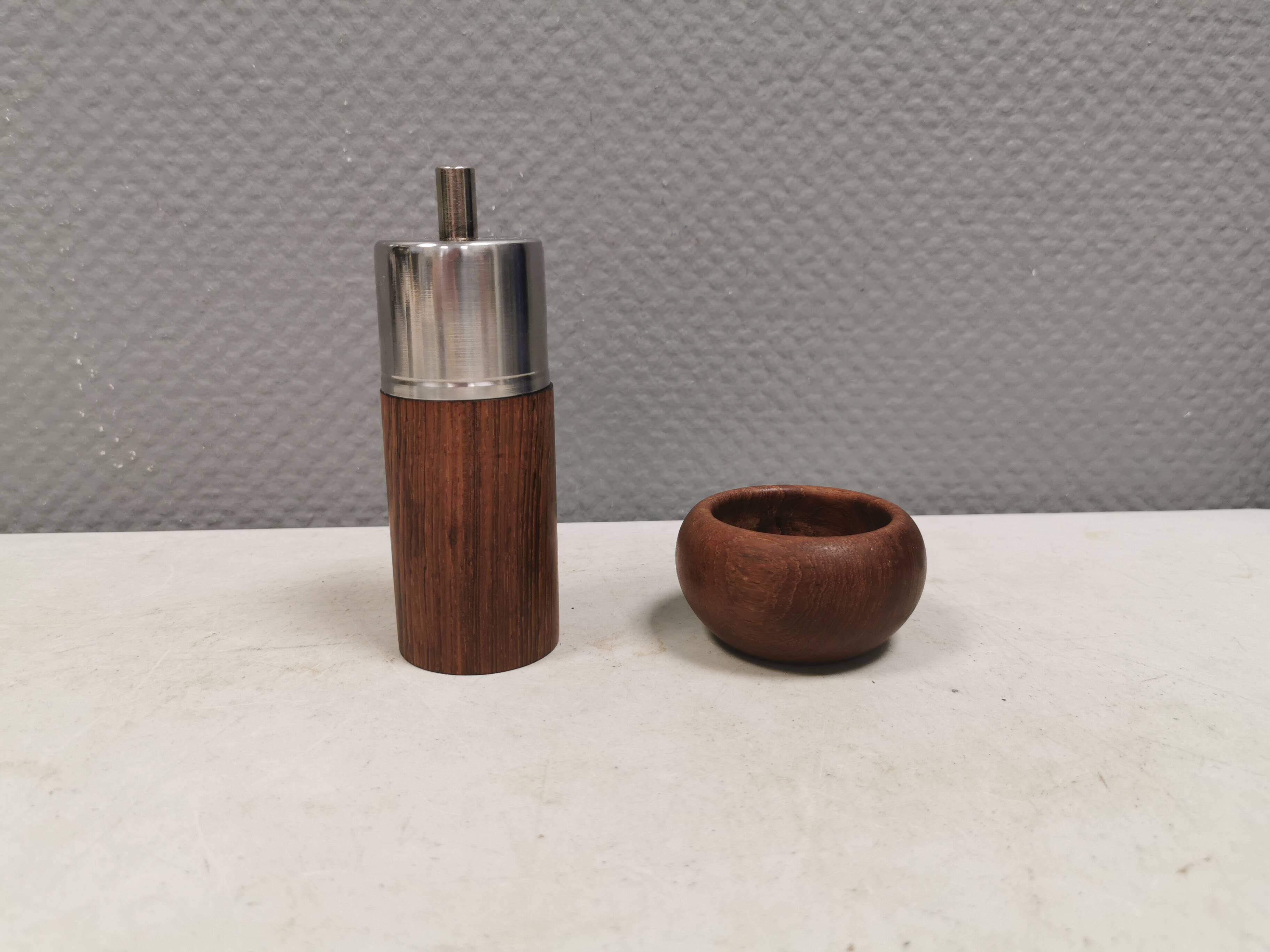 A salt shaker and a pepper mill in teak, made in Denmark 1960-70s