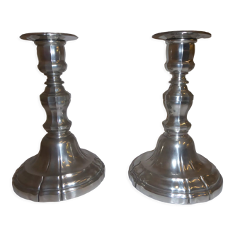 Pair of tin candlesticks