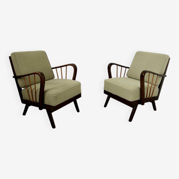 Set 2 old designer fireside chairs from the 50s wood and vintage fabric