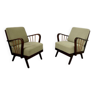 Set 2 old designer fireside chairs from the 50s wood and vintage fabric