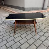 Coffee table in black glass and wood