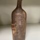 Old sandstone bottle