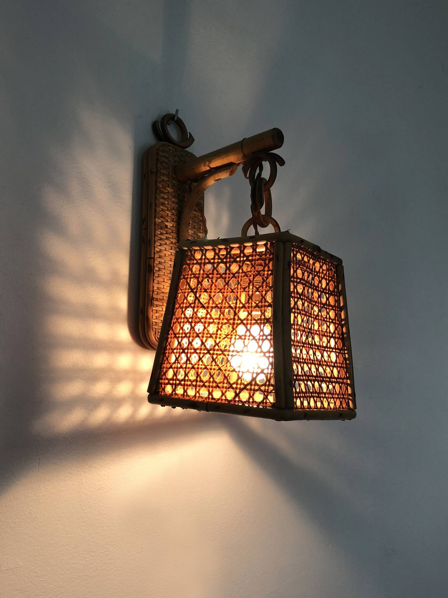 Rattan and cane lantern wall light. 1950s-1960s