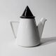 Vintage ceramic coffee pot or teapot from the 1980s, postmodern Memphis design, black and white triangles.