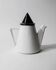 Vintage ceramic coffee pot or teapot from the 1980s, postmodern Memphis design, black and white triangles.