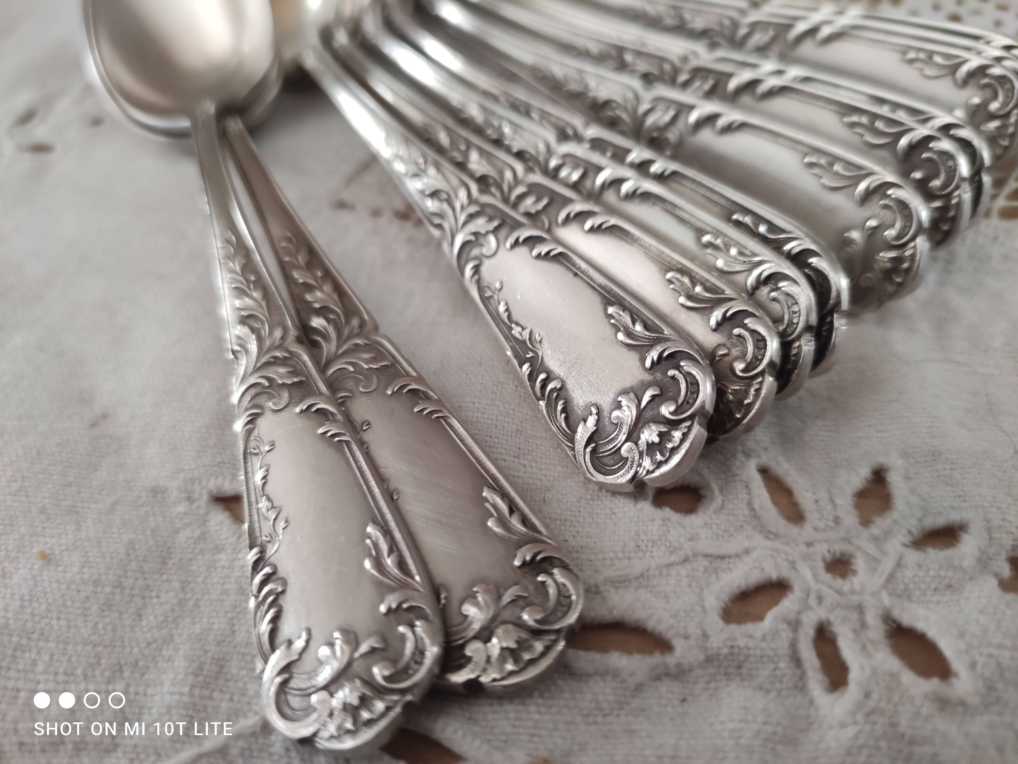 Lot of 12 small old spoons in silver metal