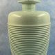Contemporary ceramic lamp foot in green celadon color to electrify