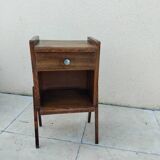 Old vintage bedside table from the reconstruction period