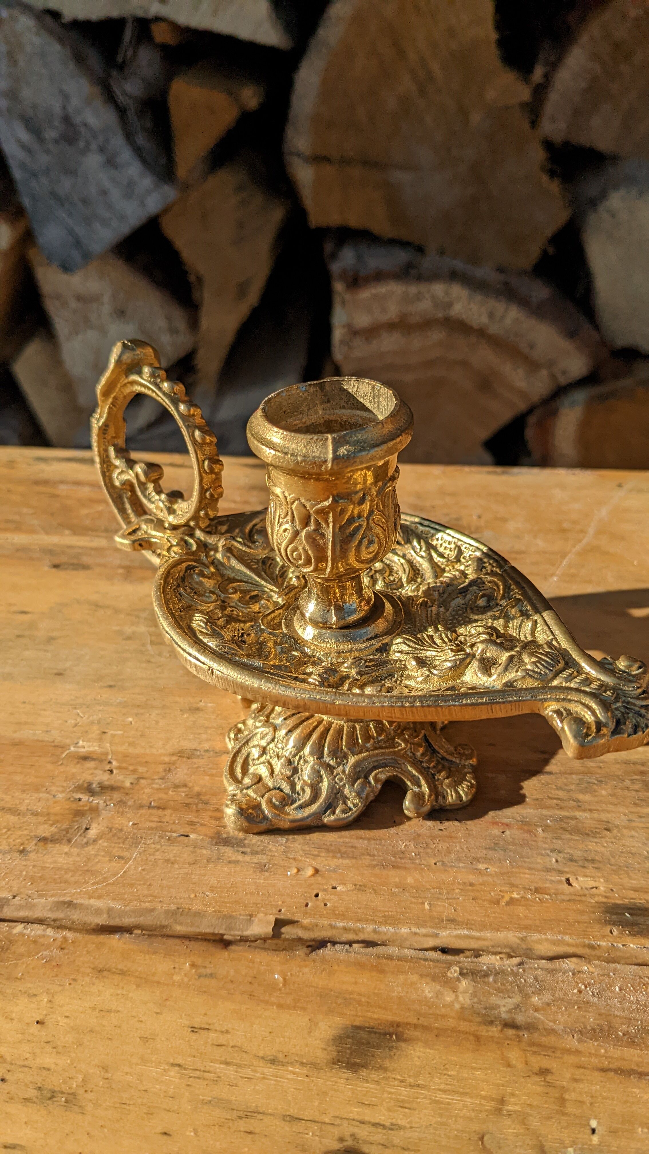 Pair of solid brass and arabesque candle holders