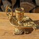 Pair of solid brass and arabesque candle holders