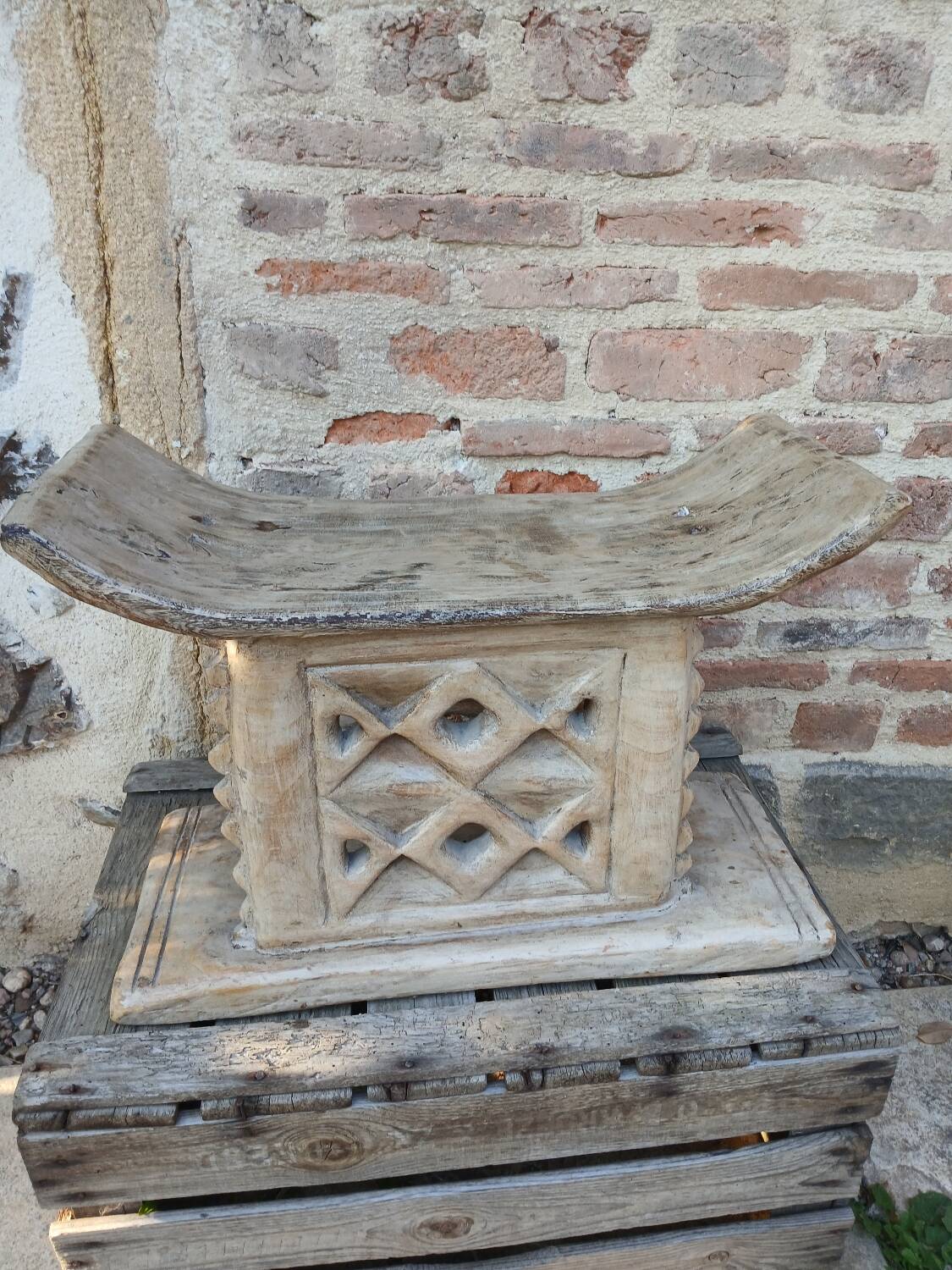 2 African carved wooden stools