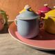 6 small porcelain cream pots from Limoges with a tray.