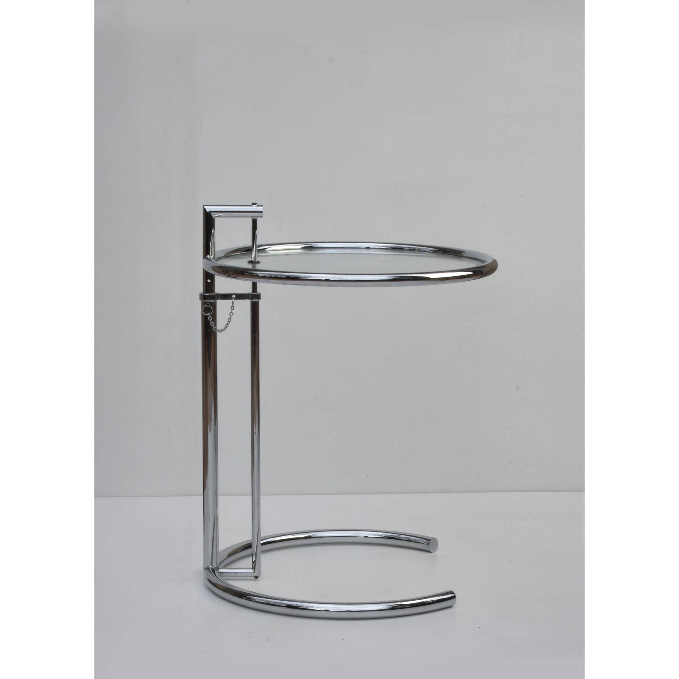Adjustable height side table in the style of Eileen Gray.