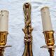Pair of French wall sconces in bronze, Louis XVI style, with cord.