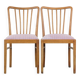 Set of 2 vintage dining chairs from the 1970s with spindle backrest and fabric seat