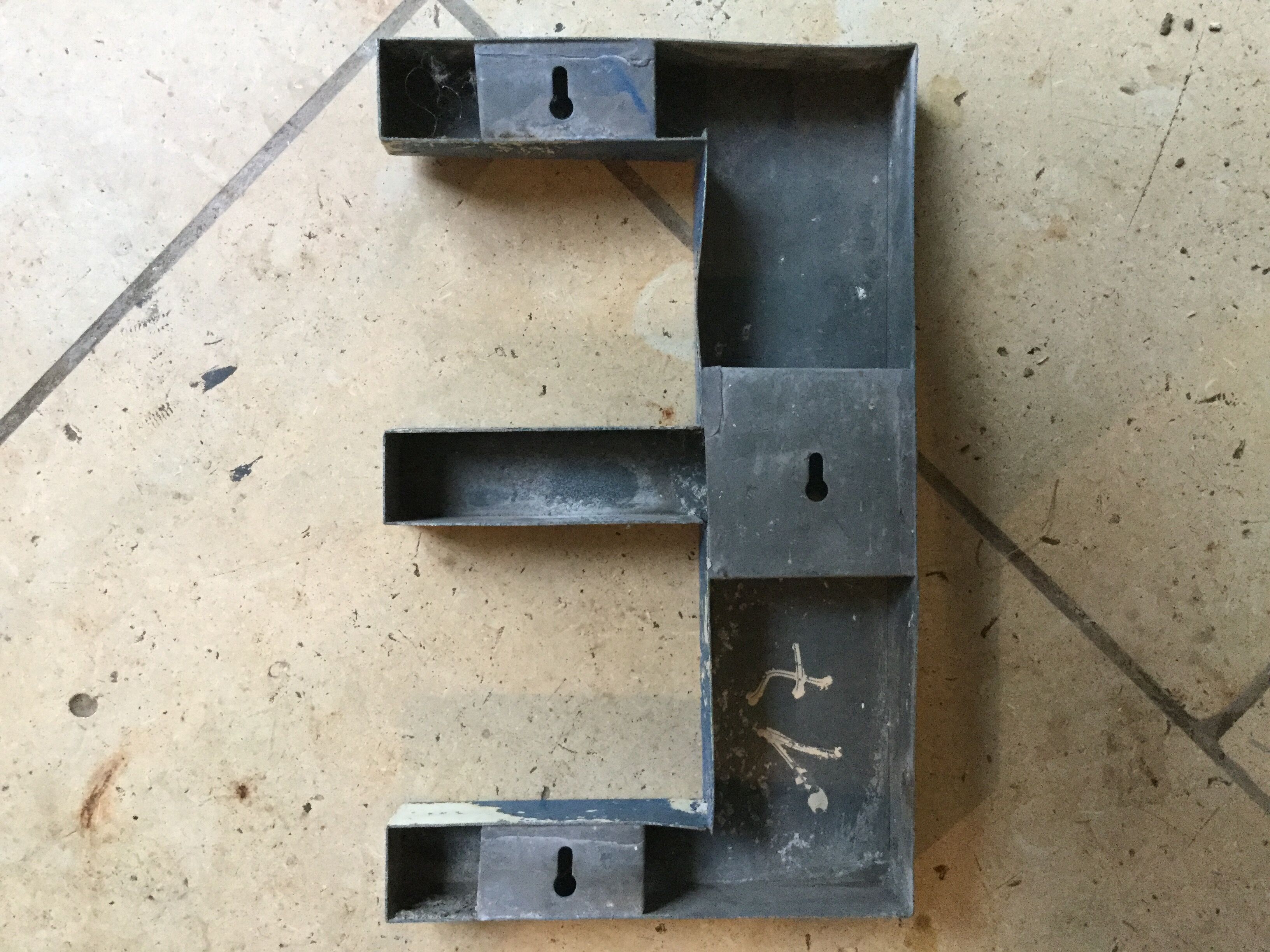 Old zinc sign letter