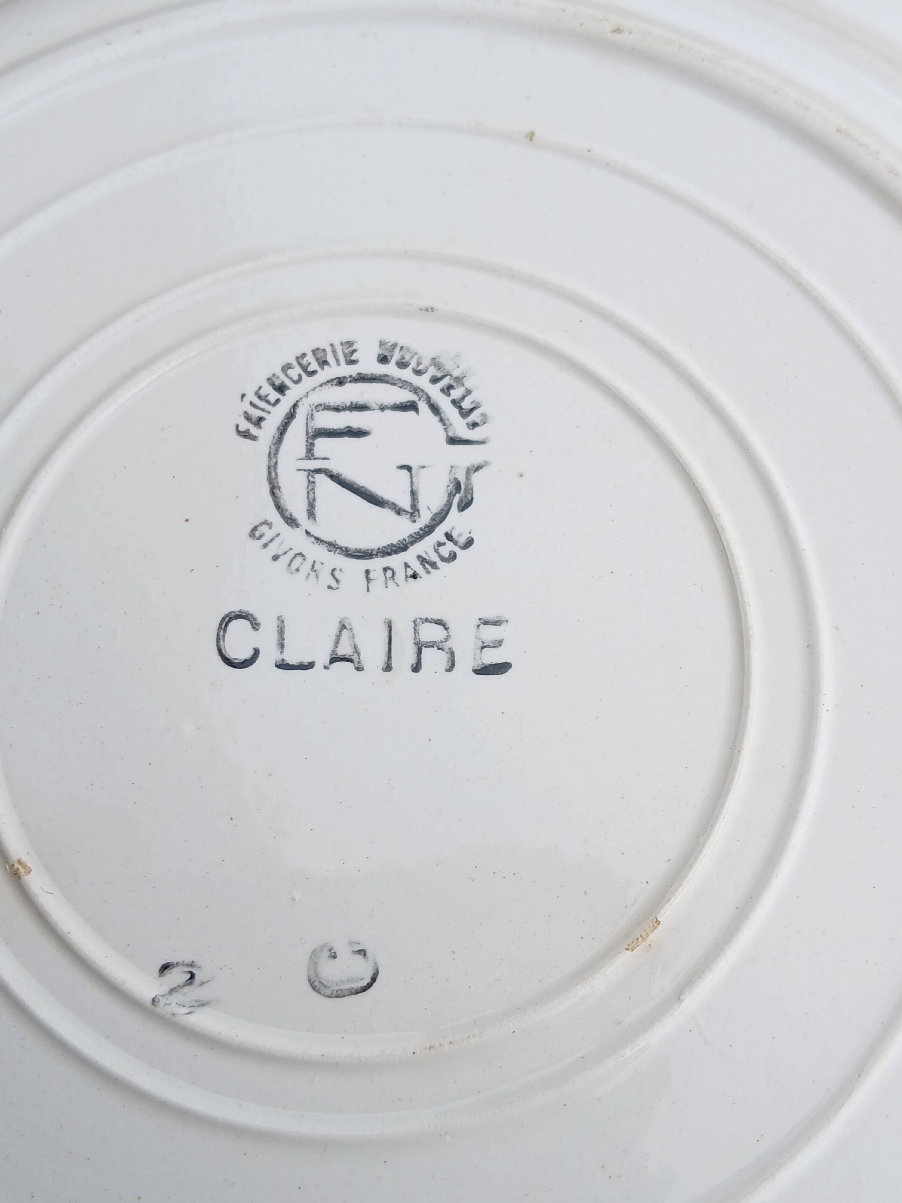 Six antique soup plates