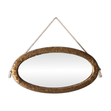 Art Deco oval mirror in gilded wood, France circa 1920