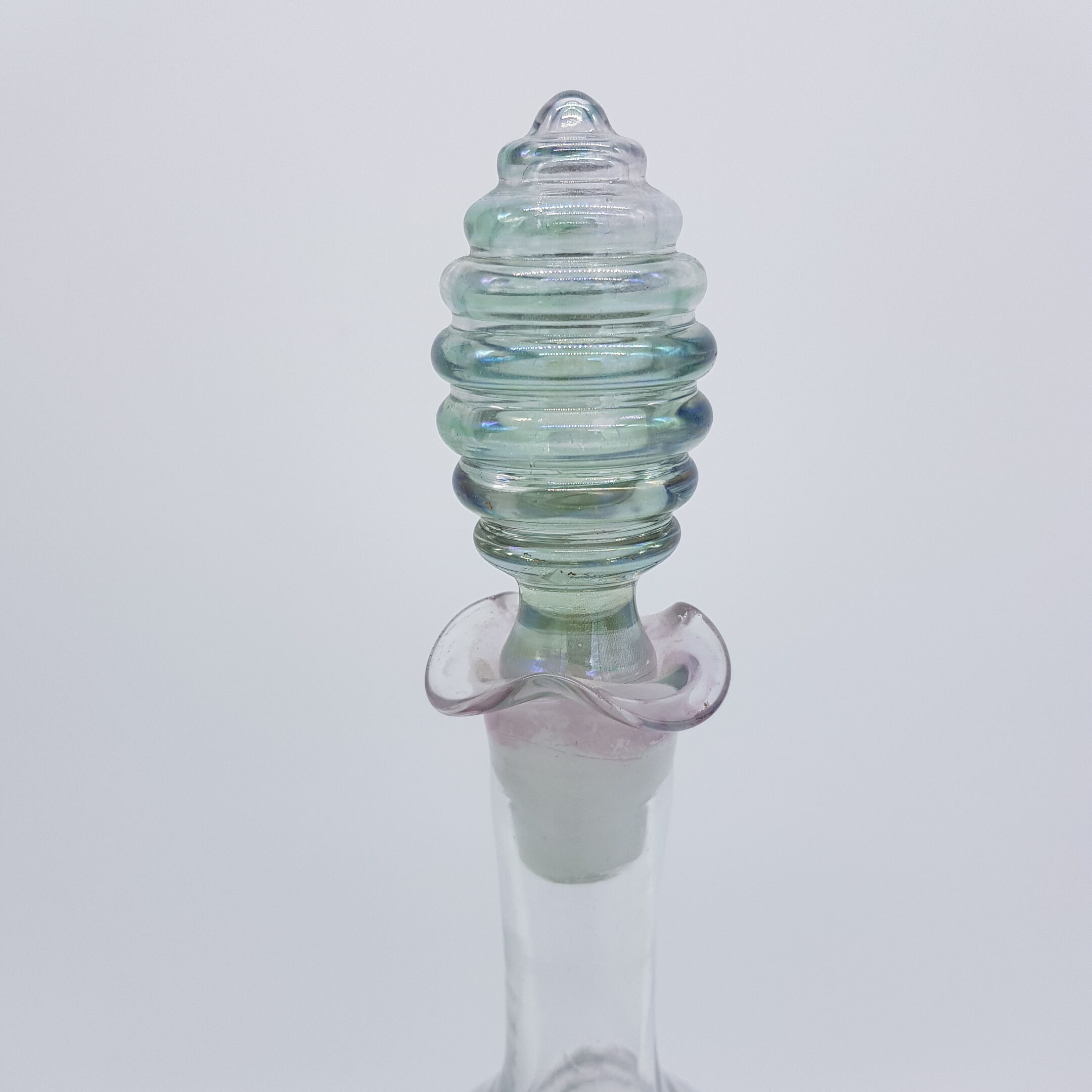 Old carafe ringed iridescent glass blown